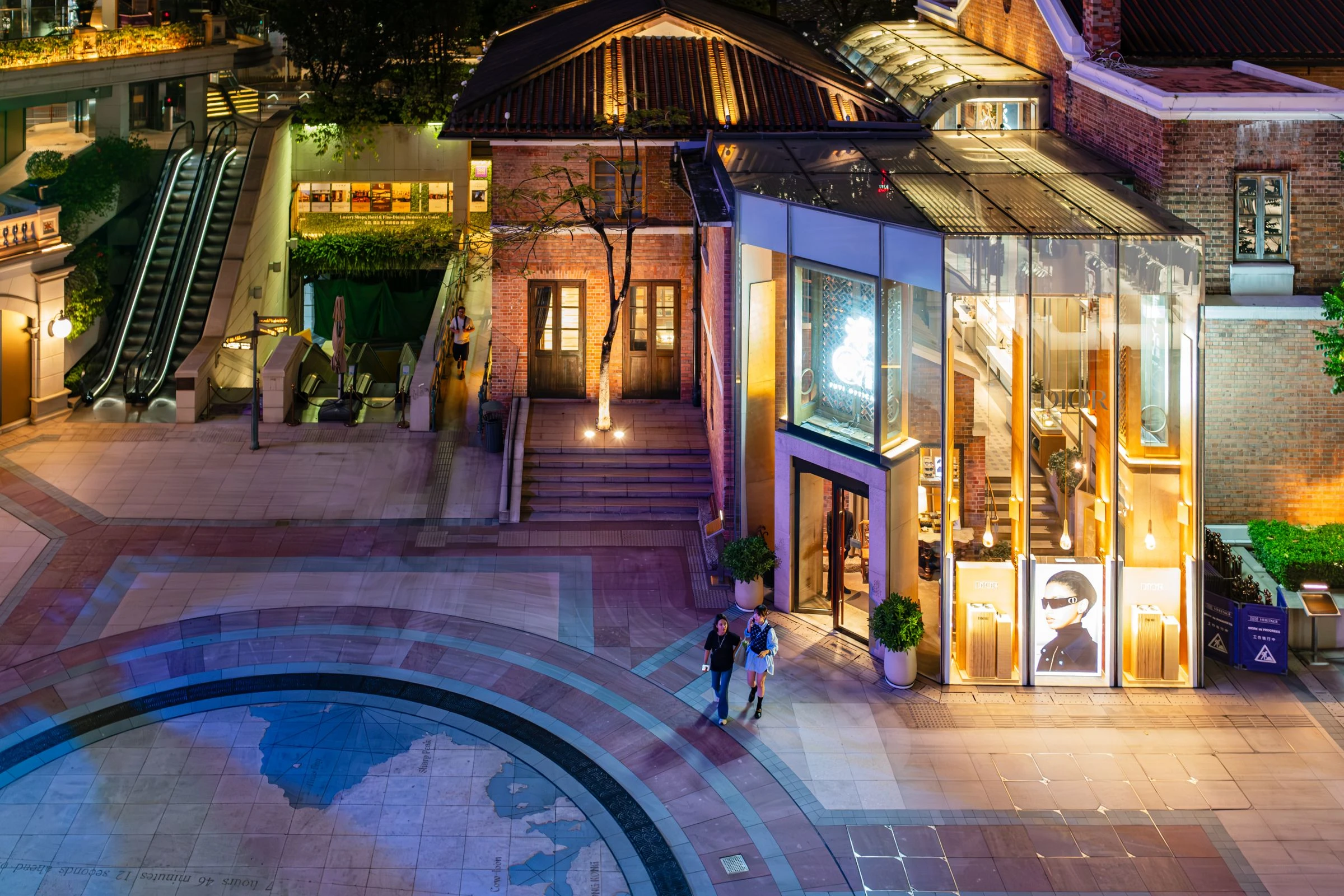 Layered facade and circulation lighting in a premium shopping complex, temporary reference photography for the Marsa Mall portfolio layout